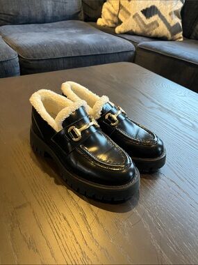 Steve Madden Black Loafers with White Faux-Fur Lining and Gold Buckle